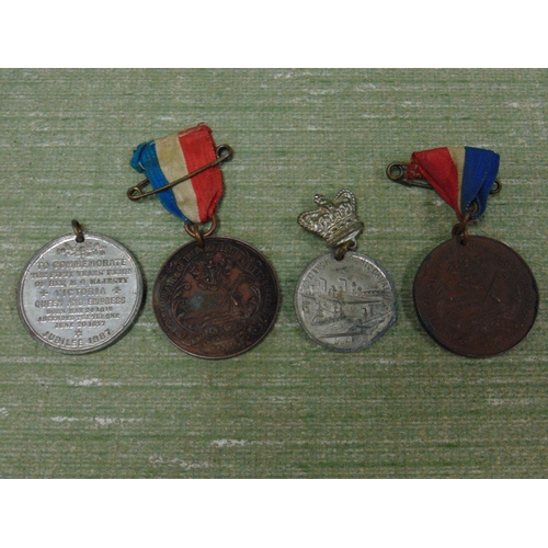 179 - Four commemorative medals, including the 1894 opening of the Manchester Ship canal.