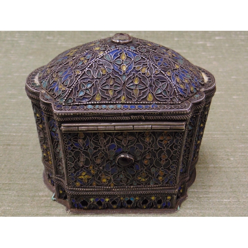 196 - An  Eastern casket, of oval form, hinged lid and having overlaid decoration, 5.5