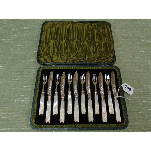 200 - Cased set of six mother of pearl handled cake knives and forks, having silver bezels.