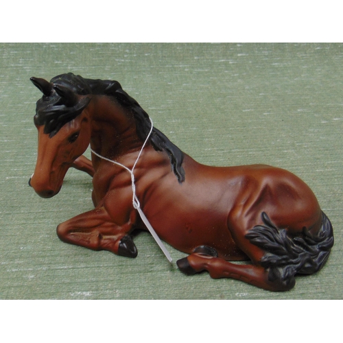 202 - Beswick matt reclining horse.