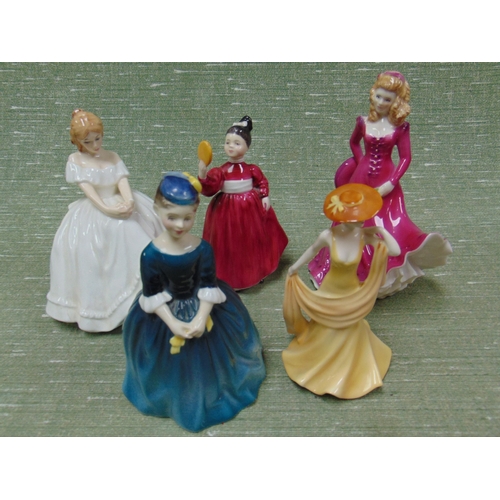 212 - Three Doulton figurines and two other examples.