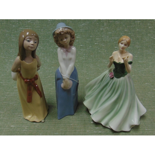 215 - Royal Worcester figurine - keepsake, Lladro figure lady (af), and a Nao example. (3)