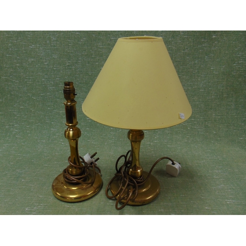 236 - Pair of gilt metal table lamps.