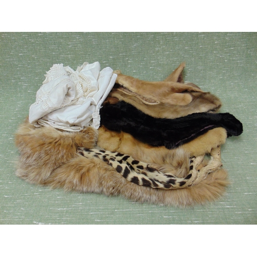 26 - Selection of furs and a small quantity of linen.