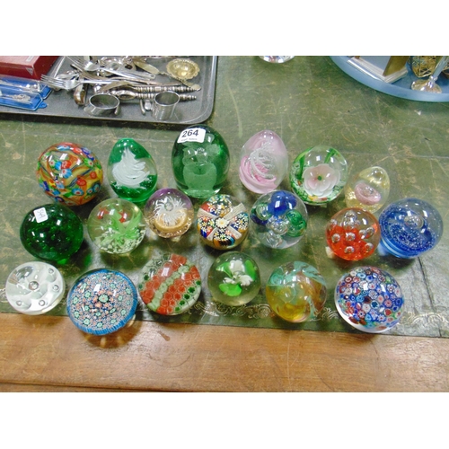 264 - Collection of coloured glass paperweights.