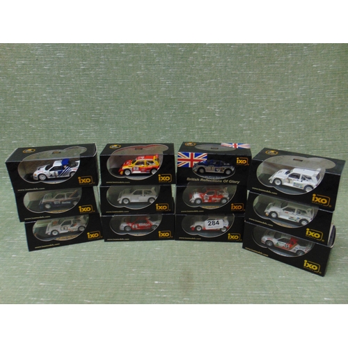 284 - 12 ixo collectable model vehicles.