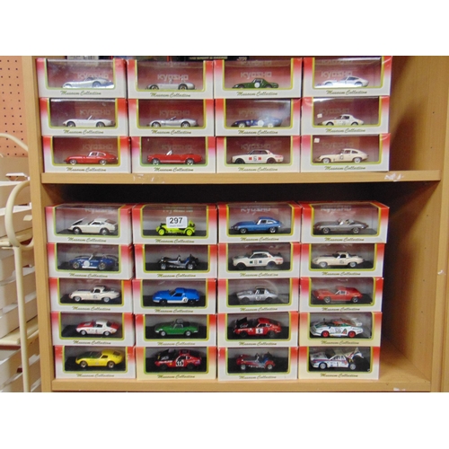 297 - 32 boxed collectable model vehicles.