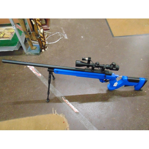 32 - Blue coloured BB gun on folding stand , with scope. Please note: Purchasers must be over 18 and phot... 