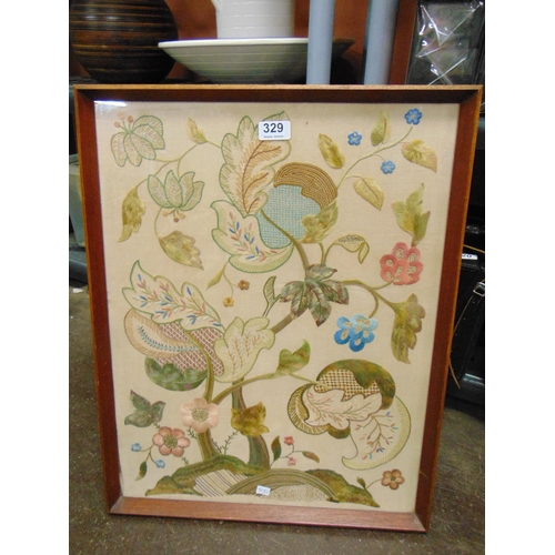 329 - Framed and glazed floral needlework.