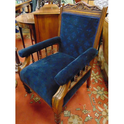 336 - Late 19th century oak framed Gentleman's chair, shaped top, upholstered back, arms and seat, spindle... 