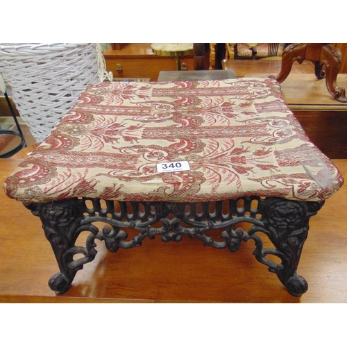 340 - Reproduction square form footstool, upholstered top and on pierced metal base.