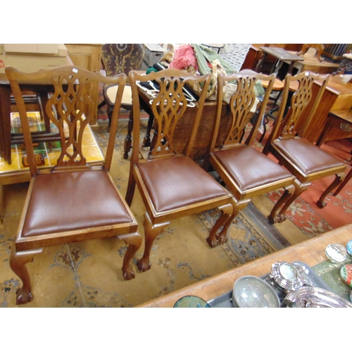 341 - Set of four Chippendale influenced dining chairs, pierced splat backs, drop in seats, on frontal cab... 