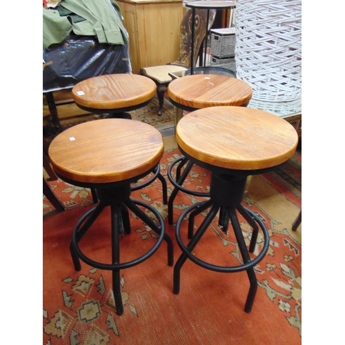 343 - Four modern adjustable stools.