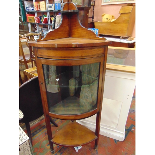 351 - 19th century inlaid mahogany corner display cabinet, raised back over single glazed bow fronted door... 