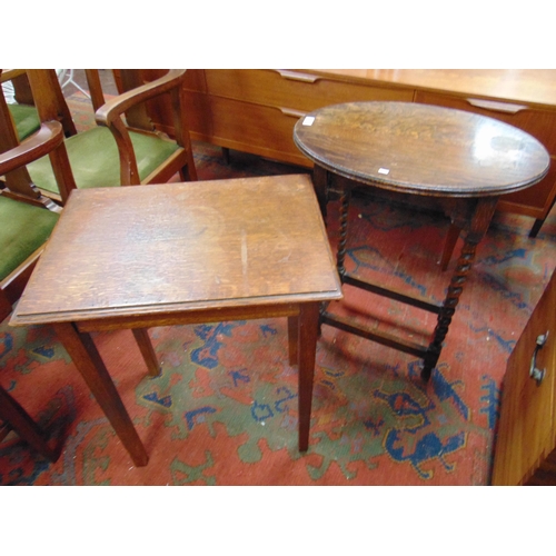 372 - An oak barley twist centre table and one other example. (2)