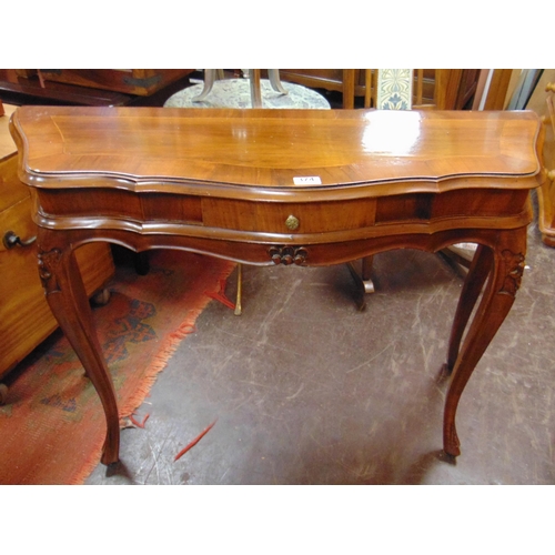 374 - Continental reproduction side table, having shaped top, centre drawer and on frontal cabriole suppor... 