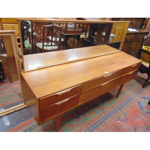 384 - Retro teak framed mirror back dressing table.