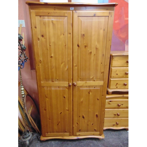 417 - Modern pine bedroom suite, comprising double door wardrobe, dressing table, mirror, chest of drawers... 