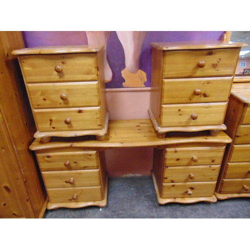 417 - Modern pine bedroom suite, comprising double door wardrobe, dressing table, mirror, chest of drawers... 