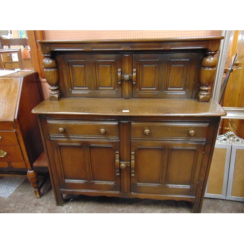 422 - Reproduction court cupboard, pair of doors, above further doors and drawers to base.  49 x 48 x 19