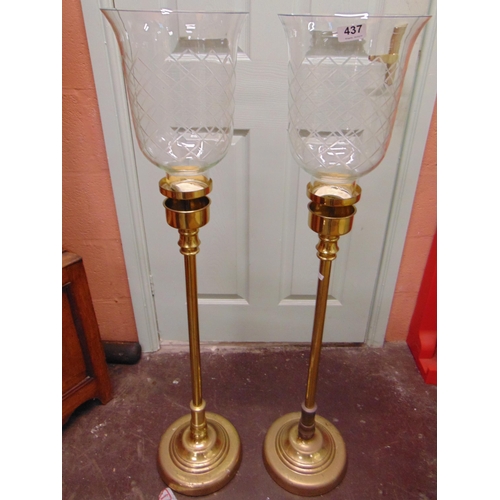 437 - Pair of reproduction candle holders, each 43.5