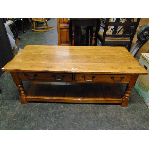 441 - An oak two drawer coffee table.