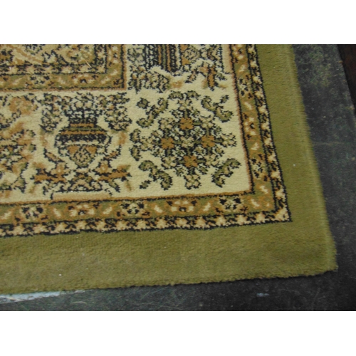 445 - Indian green ground rug, 67 x 47