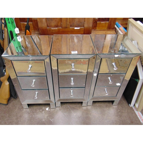 468 - Set of three contemporary mirrored glass chests of three drawers with glass handles, each 24 x 12 x ... 