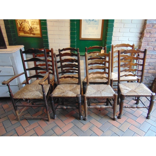 469 - Harlequin set of eight elm country made rush seated chairs. (6+2)