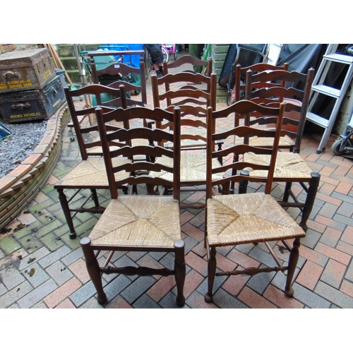 477 - Harlequin set of eight elm rush seated country chairs (7 + 1).