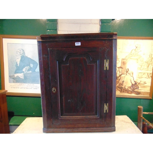 480 - Small antique oak corner cupboard , moulded cornice, above single panel door, enclosing a shelf line... 