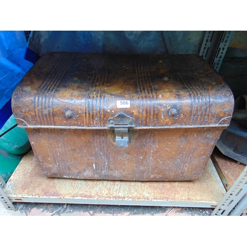 506 - Vintage tin trunk, having lift up lid and side handles.