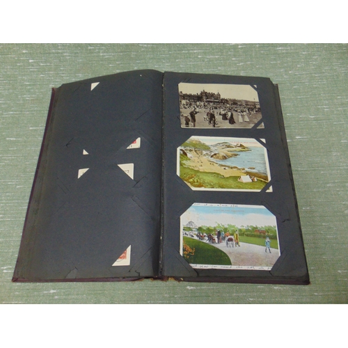 88 - Postcard album and contents.