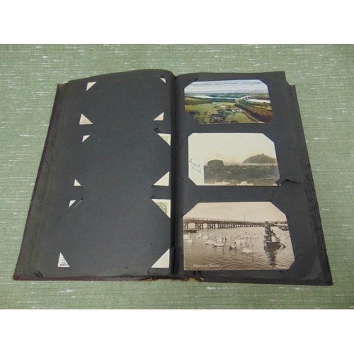 88 - Postcard album and contents.