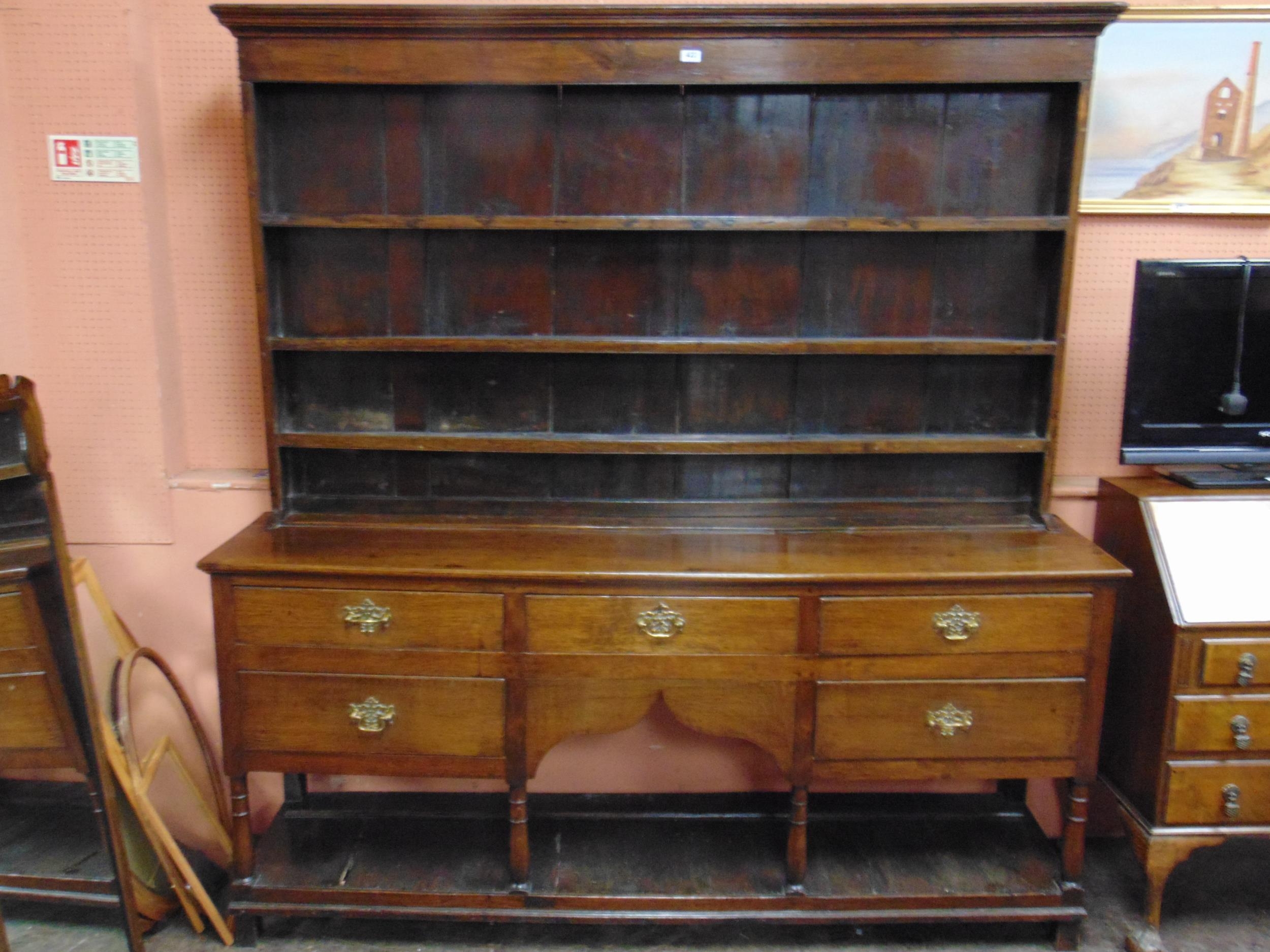 Antique oak Carmarthenshire dresser, plate rack back having an ogive
