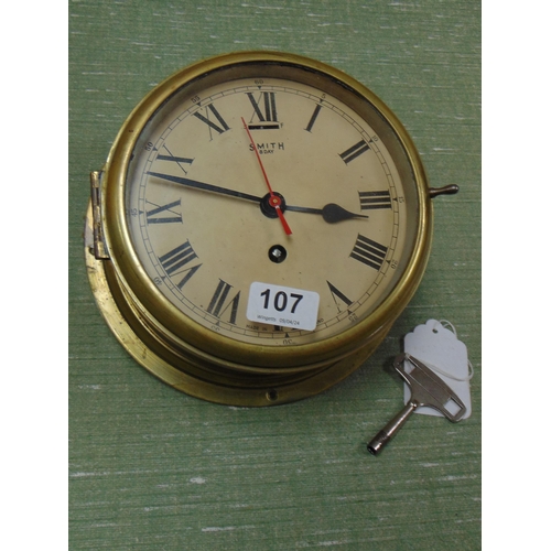 107 - Smiths bulkhead clock, having Roman numerals.