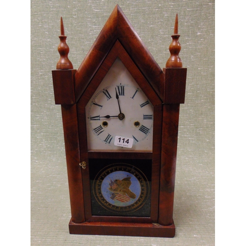 114 - Antique American mantle clock, having enamel face and Roman numerals. 19.5