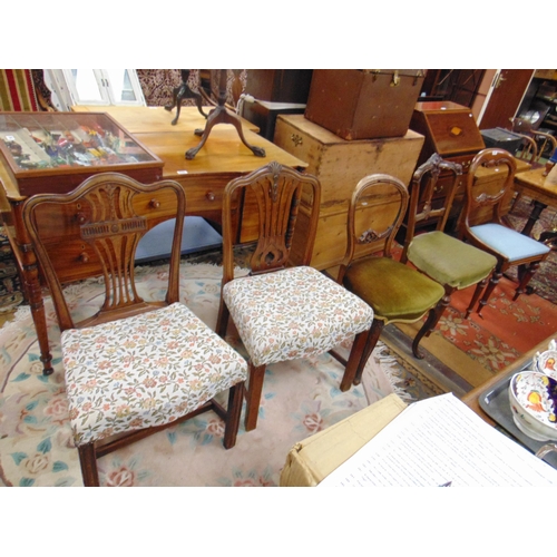 326 - Two mahogany fan back chairs and four other chairs.