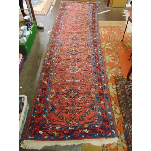 34 - Persian blue and pink ground runner, having geometric pattern. 117 x 33