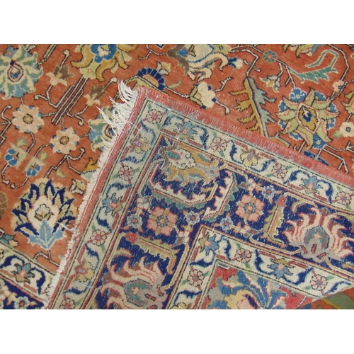 343 - Persian red and blue ground floral rug, having geometric pattern. 122 x 86