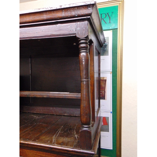 385 - Antique Welsh cwpbwrd tridarn, ogive cornice above panel back, three arched doors, pair of short dra... 