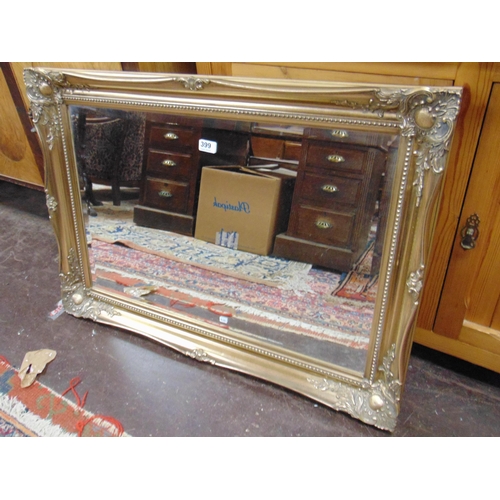 399 - Gilt framed bevel edged wall mirror, 25 x 36