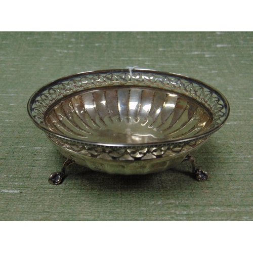 422 - Silver bon bon dish, having pierced decoration, on claw and ball feet, maker Goldsmith & Silversmith... 