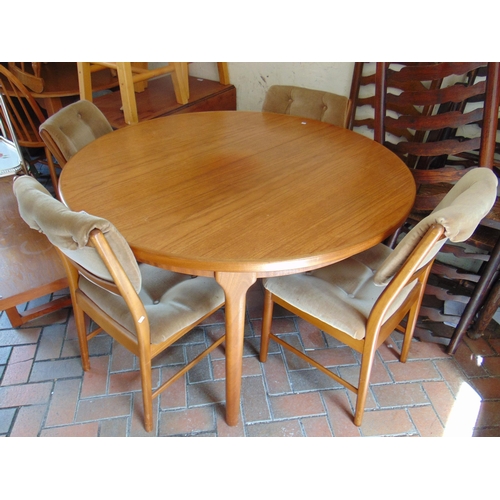 433 - Mcintosh teak extending dining table and four chairs.