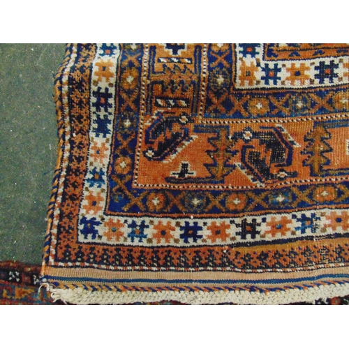 49 - Persian blue and orange ground rug, having geometric pattern. 74 x 58