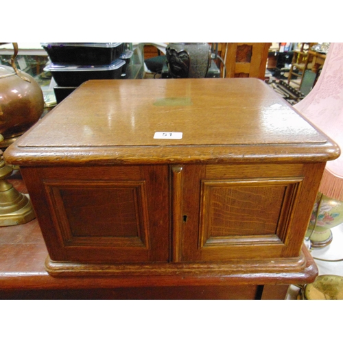 51 - R. Stewart, silver plated canteen of cutlery, contained in an oak three drawer cabinet, having round... 