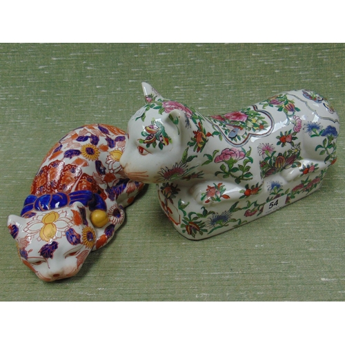 54 - An Imari style pottery cat and one other example.