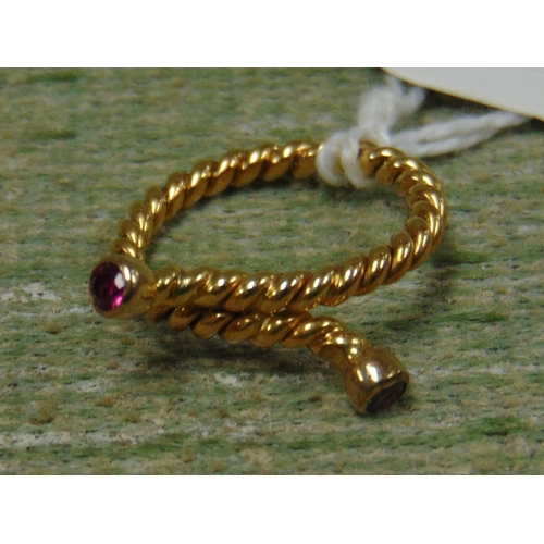 59 - Possibly gold rope twist design ring, set with pink coloured stones, size J.