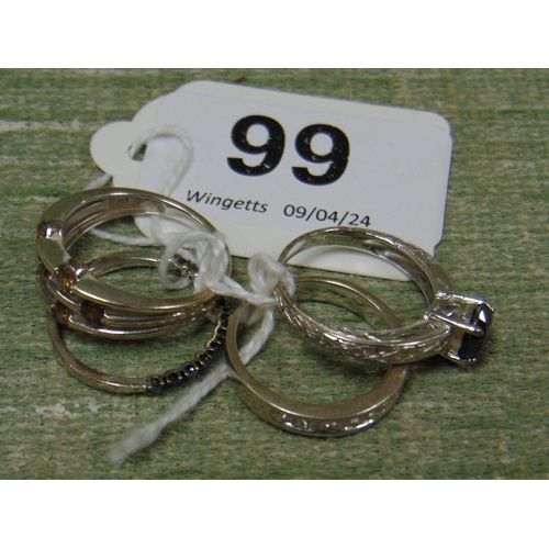 99 - Four 375 white gold rings, 11.7 gm.