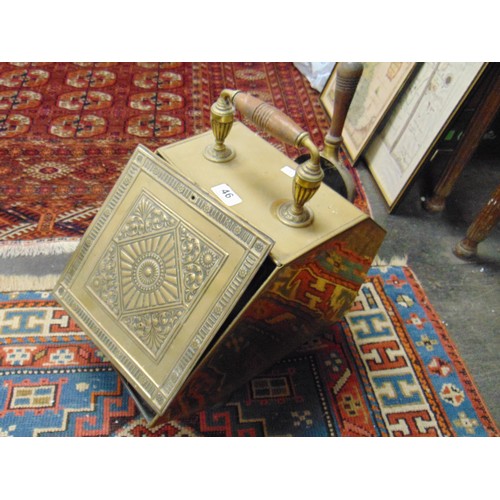 46 - Antique brass coal cox, having lift up lid and shovel.